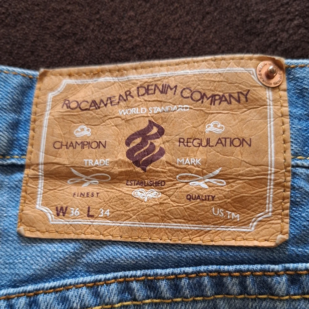 Men's Y2K jeans by RocaWear